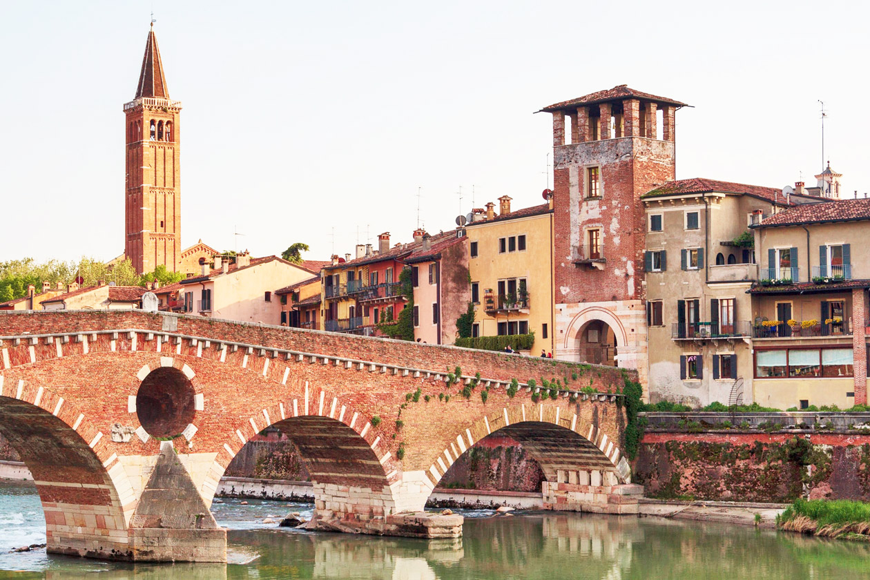 Panoramic view of Verona with the Adige River, Ponte Pietra, and historic city center 